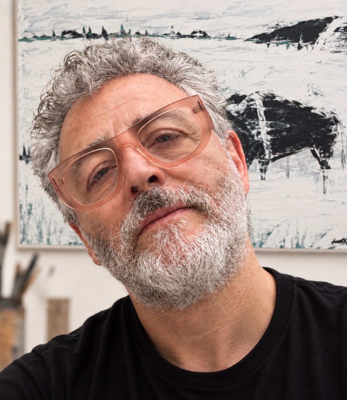 Francesco Gallé in his studio, in front of one of his paintings